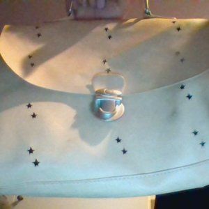 Kids tan zara bag with star holes